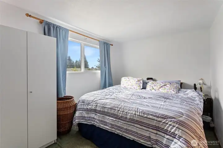 Bedroom 3 (or primary) with double closets on the main.