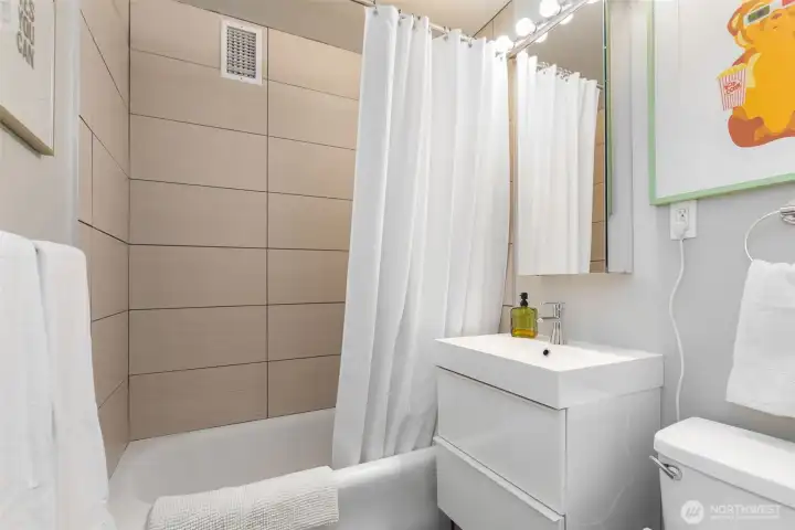 Bidet, heated floors and a large medic cabinet and plentiful storage in the vanity.