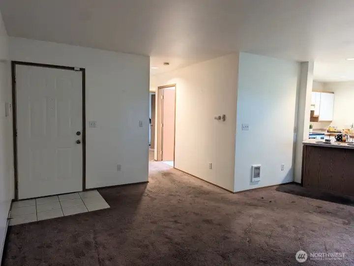 Front door & hallway to bedrooms & baths.