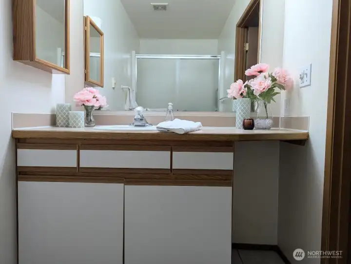 More cabinets in primary bath.