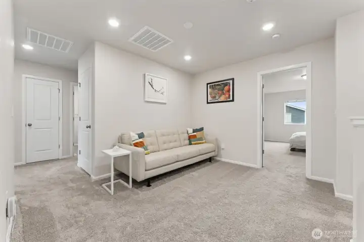 Open loft perfect for home office, play area, gym or library.