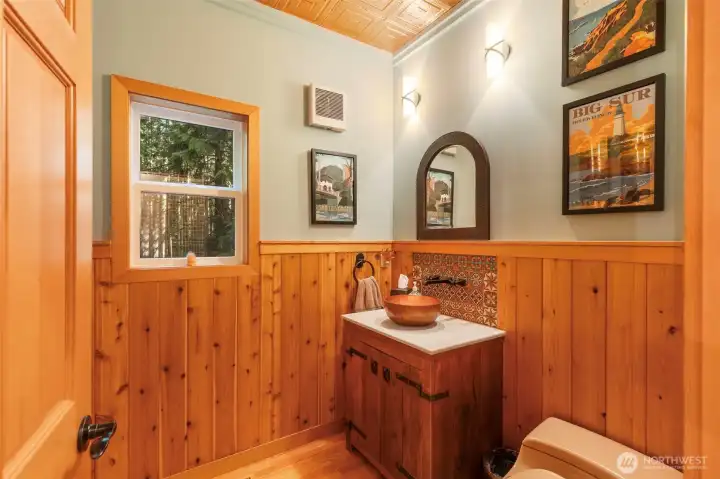 Powder room off of the kitchen