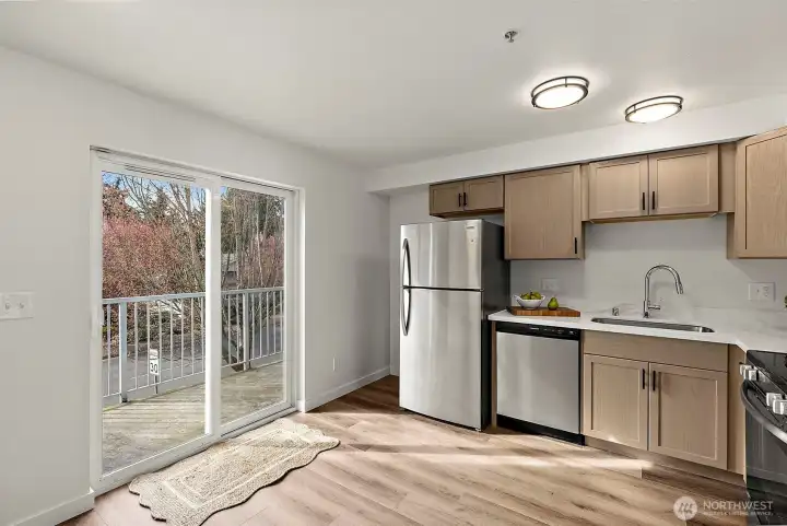 Light Filled with Sliding Glass Door Leading to Balcony!