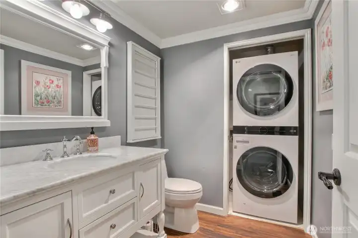 Newer vanity and hardware. Newer LG Washer/Dryer.
