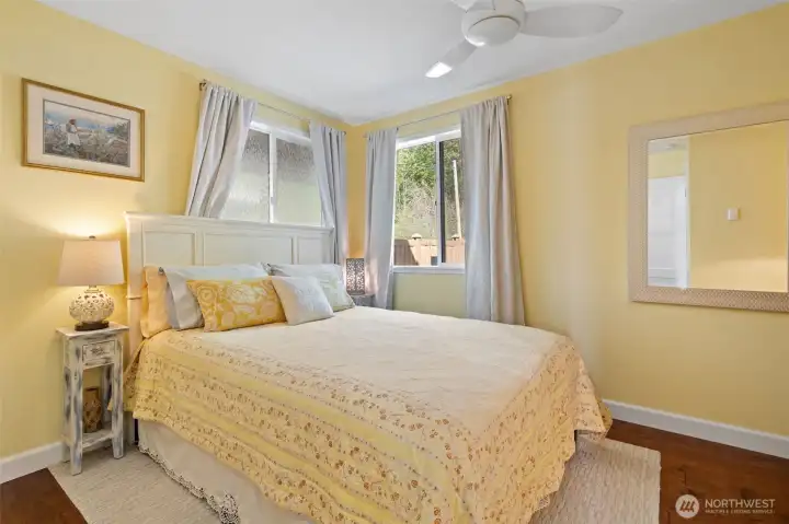 Main Floor Bedroom w/ full en-suite bathroom.