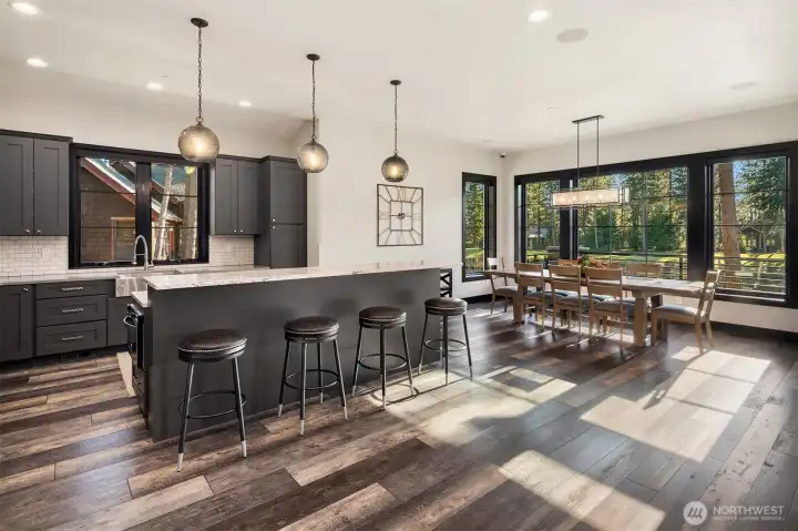 Open-concept interiors and large windows allow an abundance of natural light