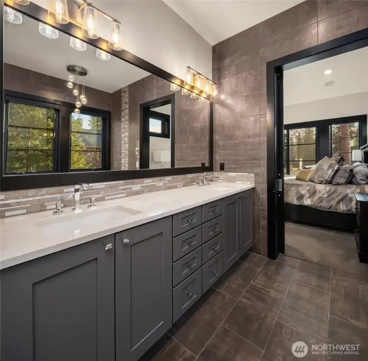 Primary Bath with dual sinks, a freestanding tub and shower