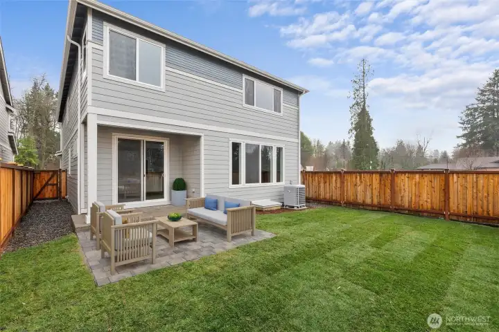 Fully fenced and irrigated back yard.