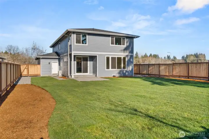 Beautiful flat back yard.