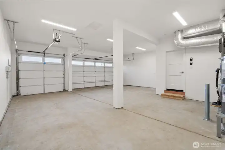 Featuring a 3 car garage fully taped and sheetrocked, includes garage openers and garage keypad.