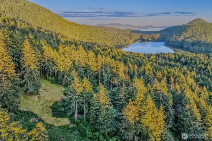 Property in the foreground, Cascade Lake at Moran State Park in the distance. Property in the foreground, Cascade Lake at Moran State Park in the distance.