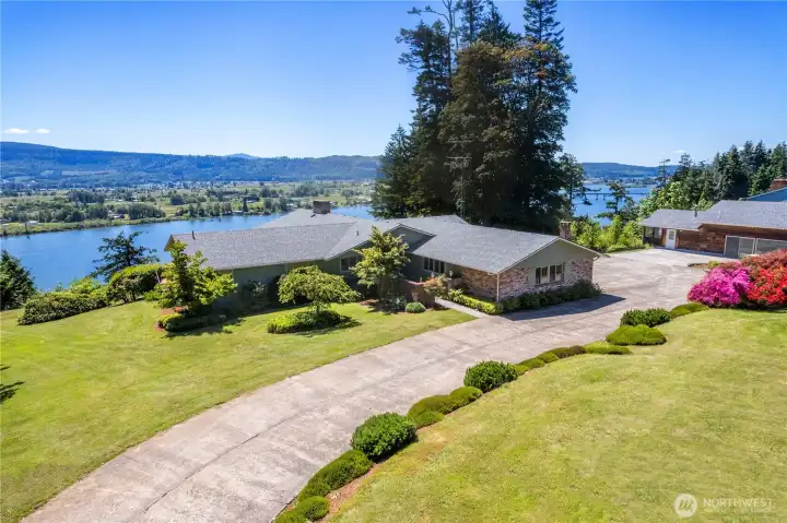 Set on nearly 4 acres across 2 separate parcels along the breathtaking Columbia River!