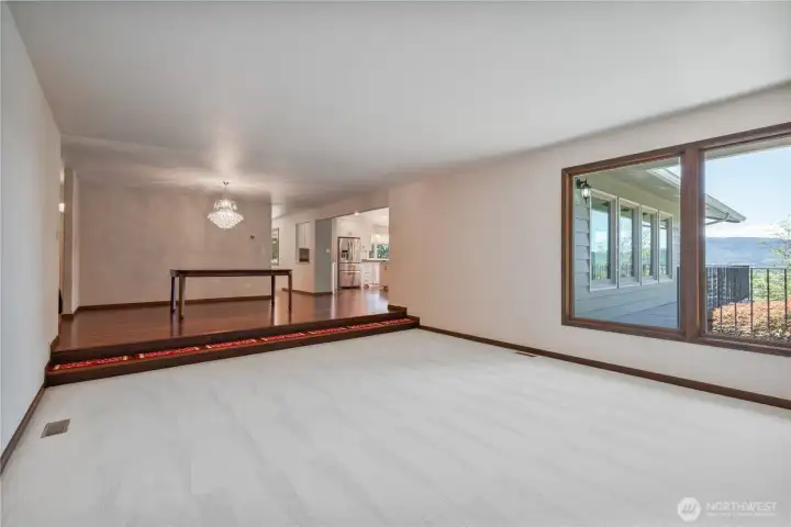 Spacious formal living room with river views.