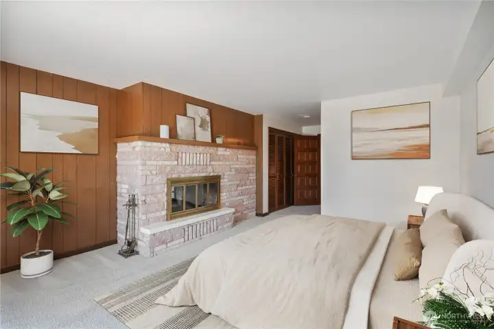 Second primary suite on the lower level with slider to the beautiful grounds and river views.