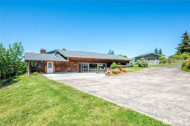 Pool house with living space, 3/4 bath, newly painted inground pool and pool deck, also wired for hot tub!