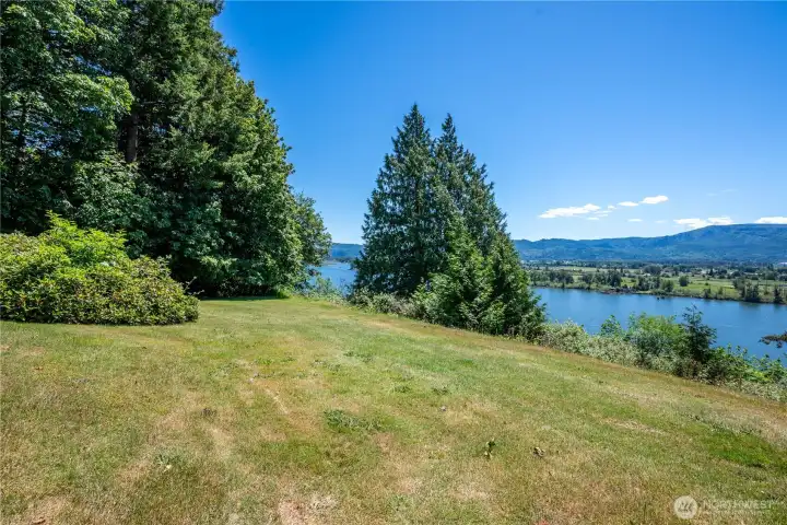 Set on nearly 4 acres across 2 separate parcels along the breathtaking Columbia River!