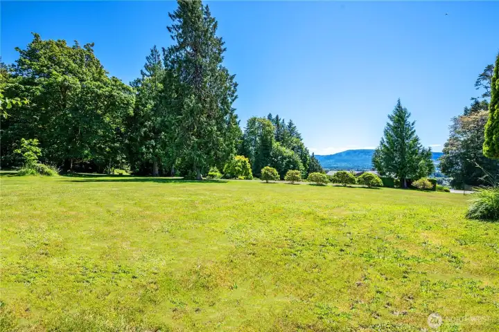 Set on nearly 4 acres across 2 separate parcels along the breathtaking Columbia River!