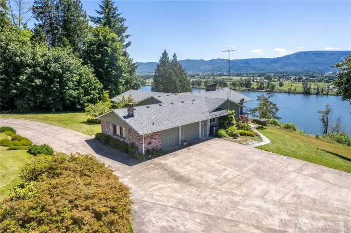 Set on nearly 4 acres across 2 separate parcels along the breathtaking Columbia River!