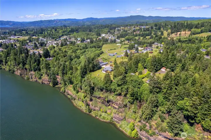 Set on nearly 4 acres across 2 separate parcels along the breathtaking Columbia River!