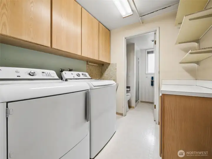 Laundry with 3/4 bathroom