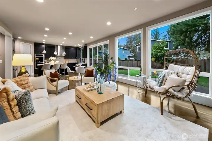 Spacious family room facing sunshine filled yard Spacious family room facing sunshine filled yard