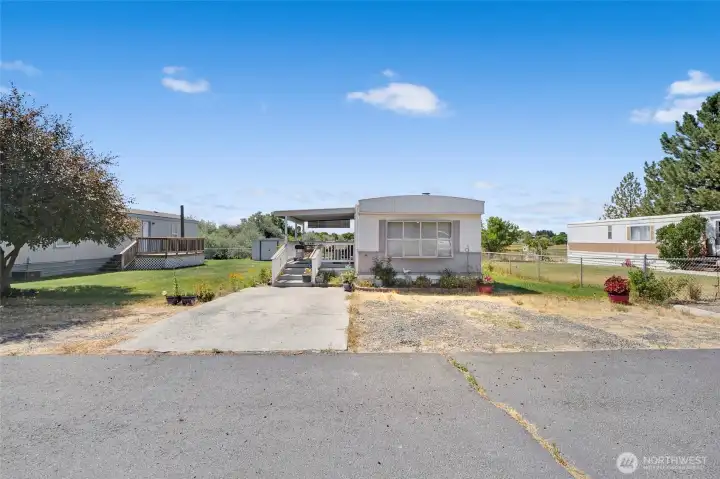 It's fenced in on the right and back sides of the home. It's fenced in on the right and back sides of the home.