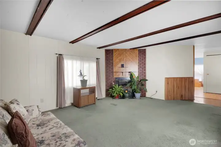 The electric fireplace on the far side is a statement piece, built in, and gives warmth in the winter time. The electric fireplace on the far side is a statement piece, built in, and gives warmth in the winter time.
