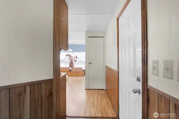 Front door into the home leads also to the kitchen and front of the home. The coat closet is ahead and handy for storing vacuum cleaners too. Front door into the home leads also to the kitchen and front of the home. The coat closet is ahead and handy for storing vacuum cleaners too.