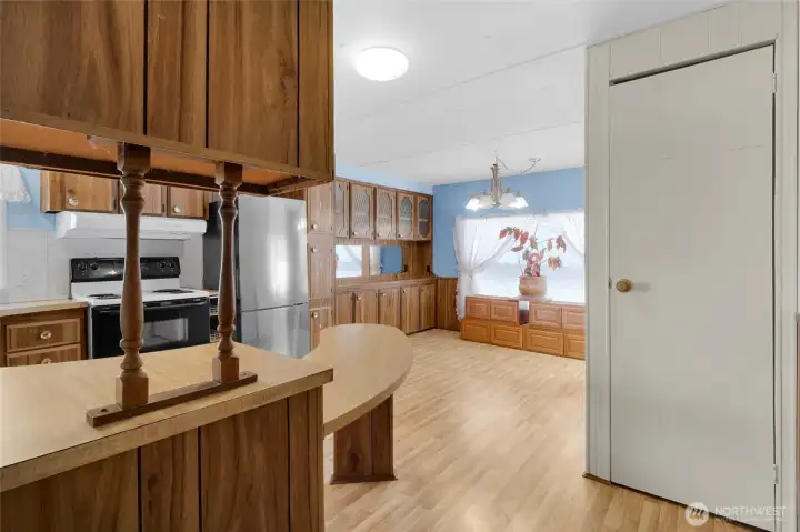 You'll love how spacious the kitchen and dining room is! The appliances stay, except the refrigerator will be replaced by a different one. You also have extra storage with the China cabinet in the background. You'll love how spacious the kitchen and dining room is! The appliances stay, except the refrigerator will be replaced by a different one. You also have extra storage with the China cabinet in the background.
