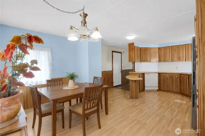 Virtually staged dining room. Virtually staged dining room.