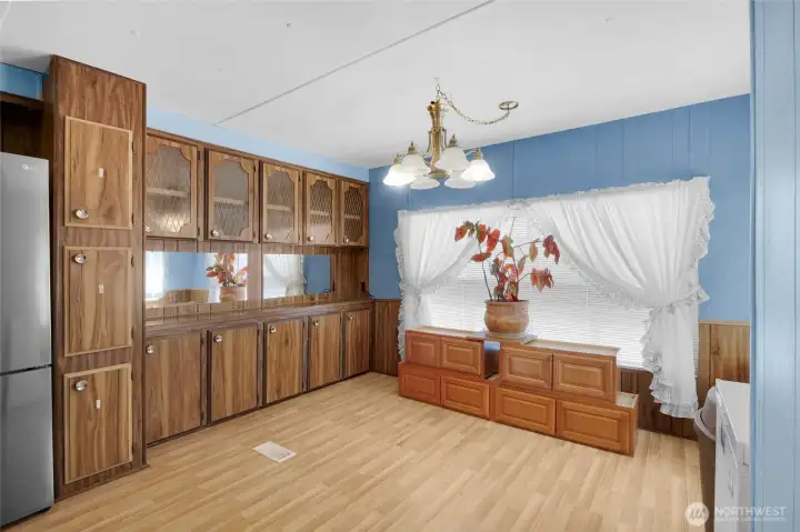 Keep the cabinets by the window or move them to place your kitchen table there. Keep the cabinets by the window or move them to place your kitchen table there.