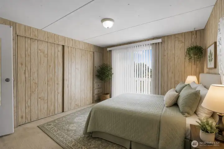 Virtually staged primary bedroom. Virtually staged primary bedroom.