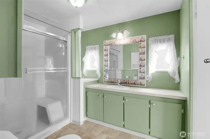 Bathroom with large walk-in shower. Bathroom with large walk-in shower.