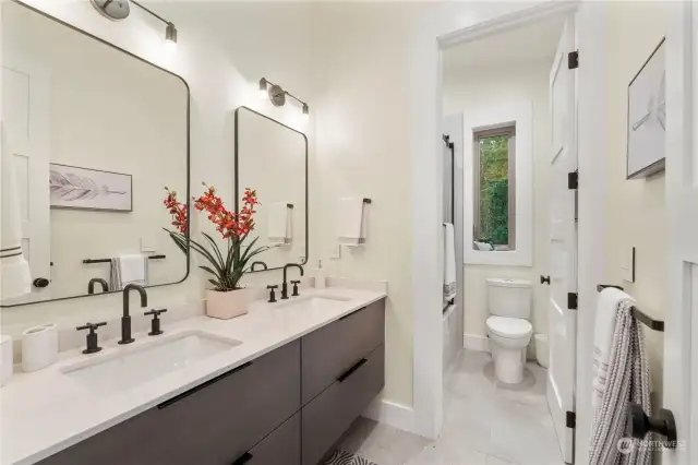 Upper Floor Full Bathroom, with privacy water closet & shower/tub.