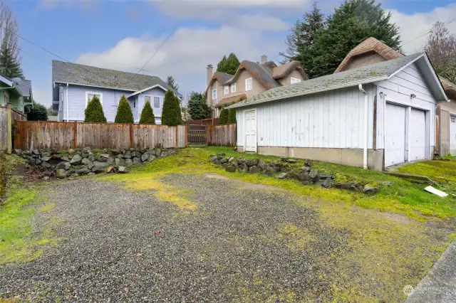 Extra parking space next to detached garage.