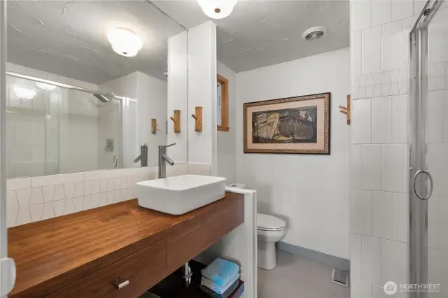 The primary bathroom offers stylish updates.