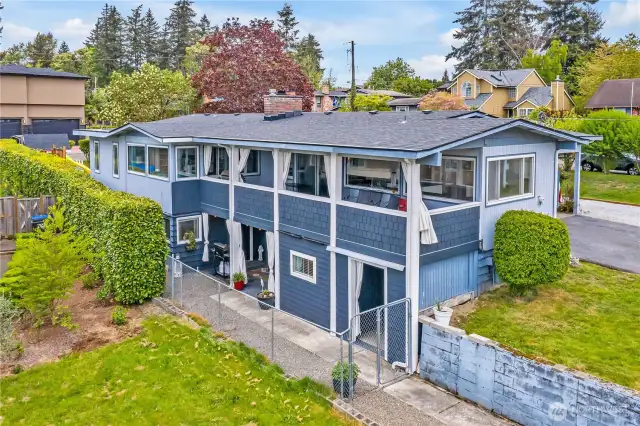 Large deck on main and 2 separate patio areas down.
