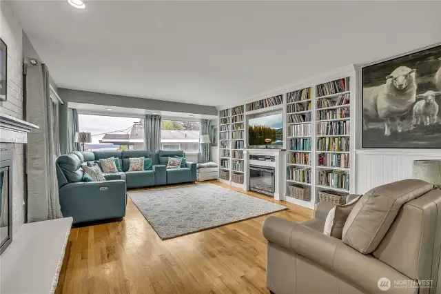Electric fireplace stays with the home in Formal living room upstairs
