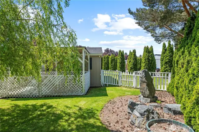view from backyard looking to house/garage