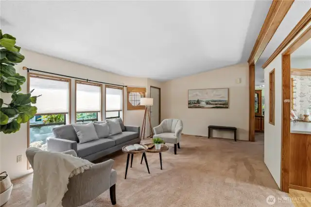 view of living room to front door