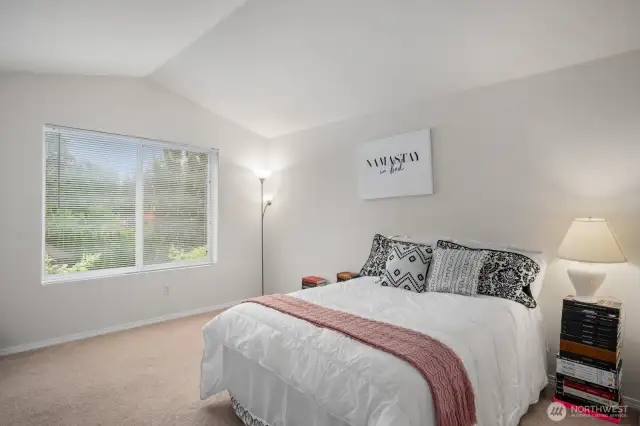 Primary Bedroom with vaulted ceiling