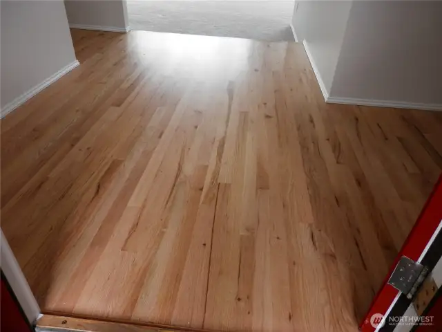 All the real hardwood floors are resurfaced, stained, and sealed. They are now restored to perfect condition.