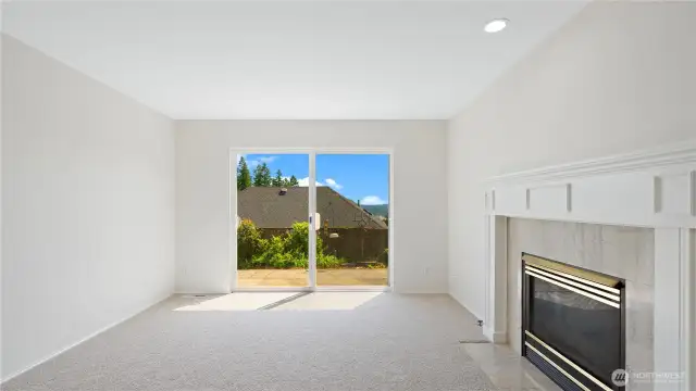 Big family room can be enjoyed with your gas insert fireplace to warm you during those cold wet winter days.