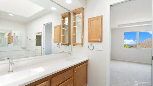 Primary has it's own private bath which has been remodeled too.  The large skylight lets in the natural light.