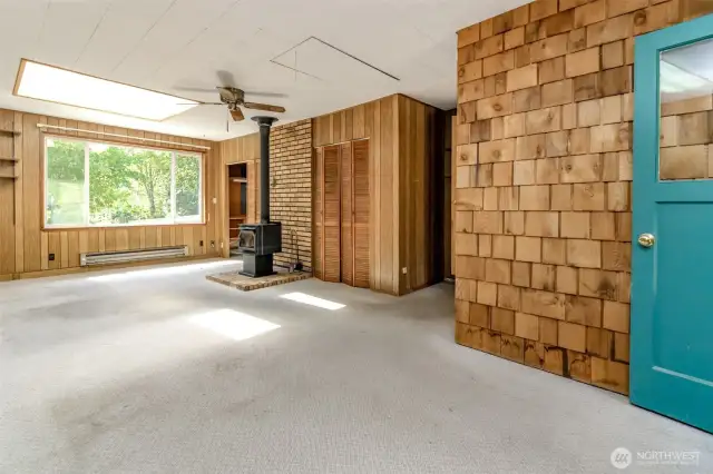 Extra living space.  The owner converted the original garage into this unique living space.