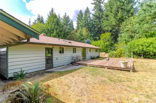 Back of the home with deck.