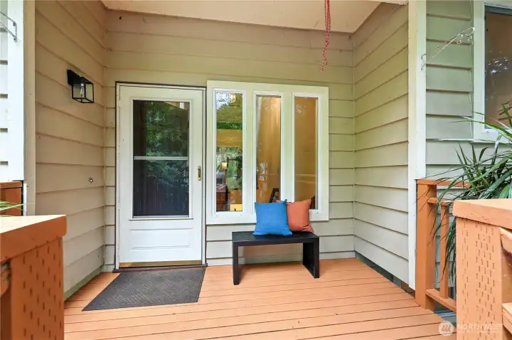 This inviting front porch welcomes you home.