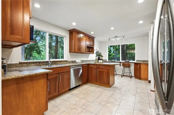 Large windows let in lots of natural light, and long countertops means more than one person can be at work at once!