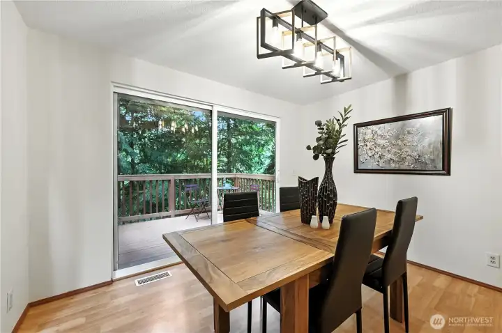 Dining with sliding doors off to deck.