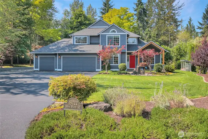 The home offers a sprinkler system for the front, side and a portion of the rear yard, along with drip irrigation for plants and shrubs. The lawn is wired for a robot mower as well.